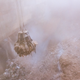 A mechanical claw grabs garbage to feed into the furnace.